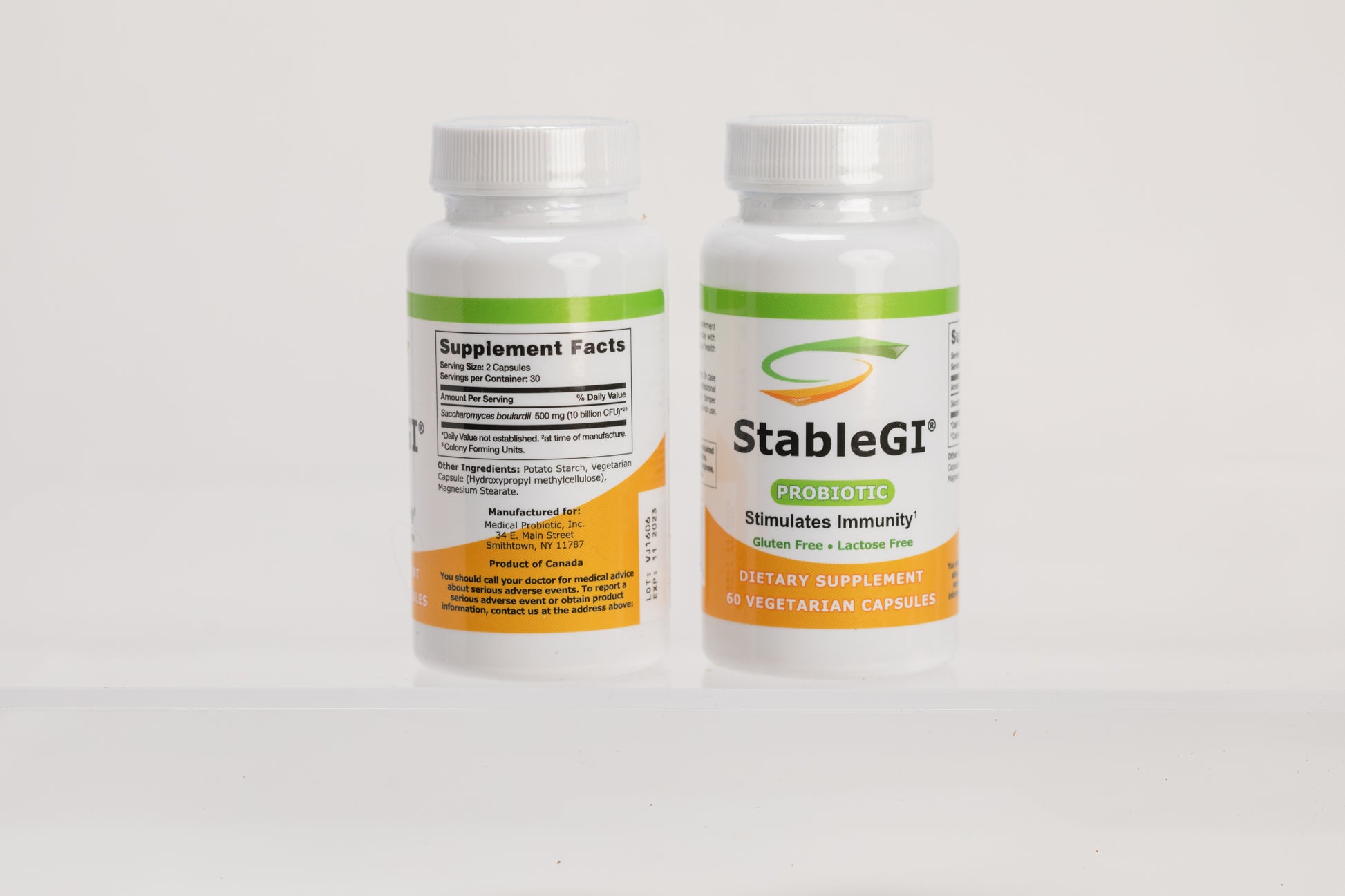 A picture of 2 bottles of StableGI probiotic showing the front  label on one bottle and the supplement facts panel